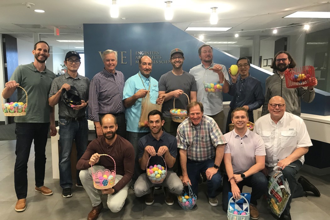 Around the Office: Dallas staff hunt for candy-filled eggs stashed throughout their work spaces.