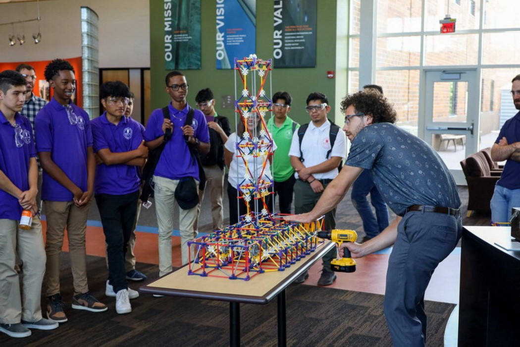 Our Janney Technical Center hosted students from the Midtown Education Foundation (MEF) as part of a high school apprenticeship program for engineering and architecture at MEF. The organization guides low-income urban youth in Chicago in personal and career development. This educational shake table (made entirely of building toys) is used to explore structural dynamics phenomena such as resonance, multimodal behavior, and torsional irregularities.